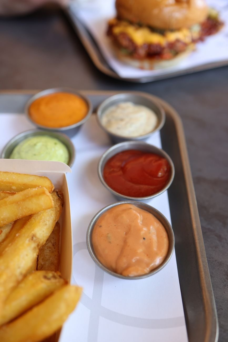 assorted dipping sauces with french fries